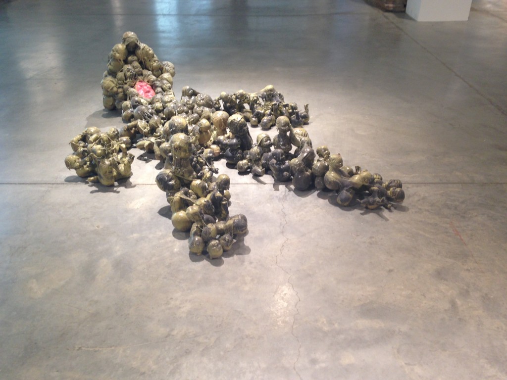 A ceramic sculpture in OSU's BFA Senior Projects Exhibit,  it depicts miniature human figures that form a larger one. Urban Arts Space, April 21, 2015.